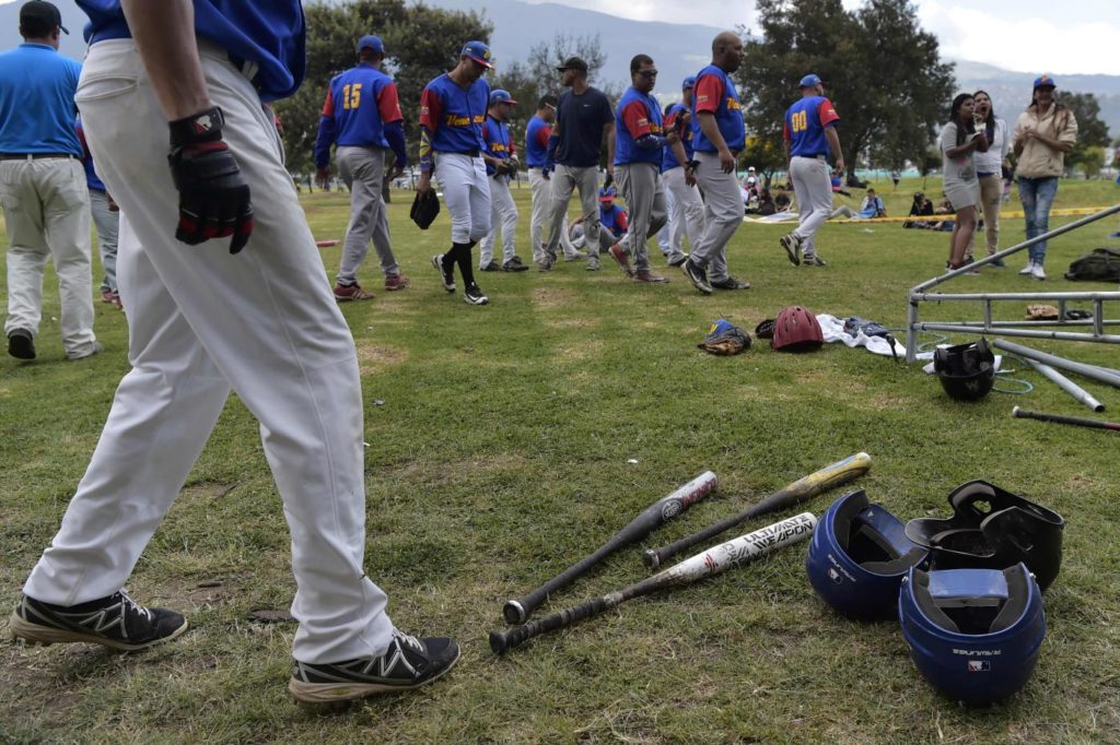 TOPSHOT-SOFTBALL-ECUADOR-VENEZUELA-MIGRATION