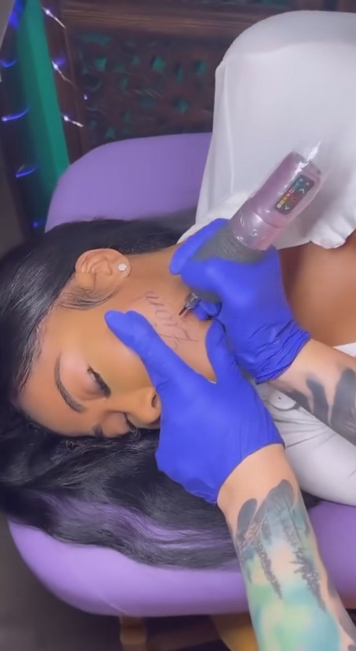 Moriah Mills tatuaggio faccia Zion Williamson